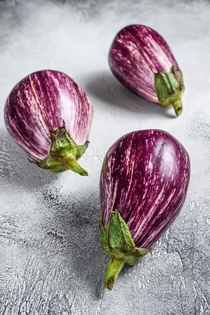 resized640_raw--small--purple--asian--eggplants--white--background--top--view--89816--19437--jpg--seq-3.webpVinete ALBE ROZ (BYAL ROZOV) - Seminte de Vinete Albe cu Roz Soi timpuriu alb, 1 gram, Opal